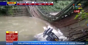 Irang bridge at Taubam in Noney District collapsed with a loaded truck; villagers and CRPF personnel rescue handyman, driver succumbs
